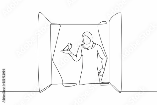 Single one line drawing young Arabian woman standing on windowsill with bird in arm. Happy female on balcony with her pet. Open window to get fresh air. Continuous line draw design vector illustration