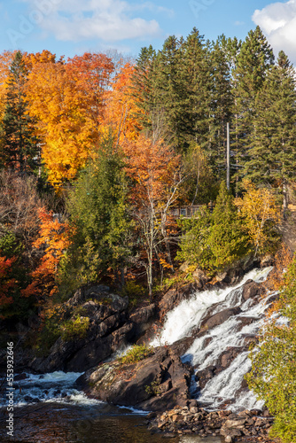 Waterfall and trees with fall colors at Montagne d'argent. Quebec. Canada.