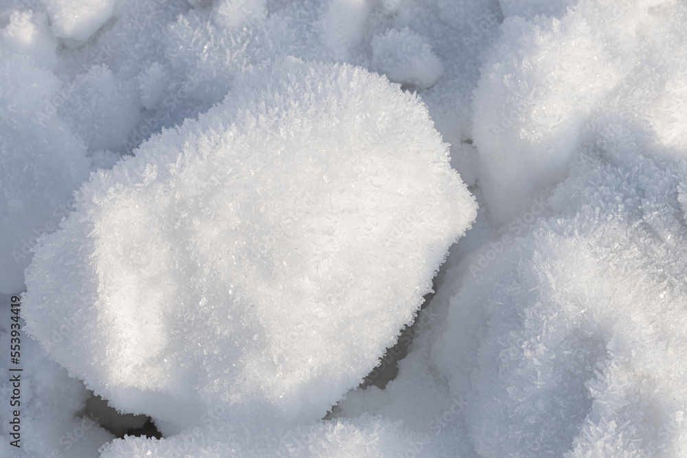 a large snowball lies on the snow a large snowball lies on the snow