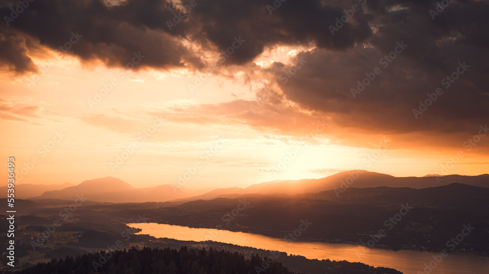 sunset over the Worthersee in the Alps