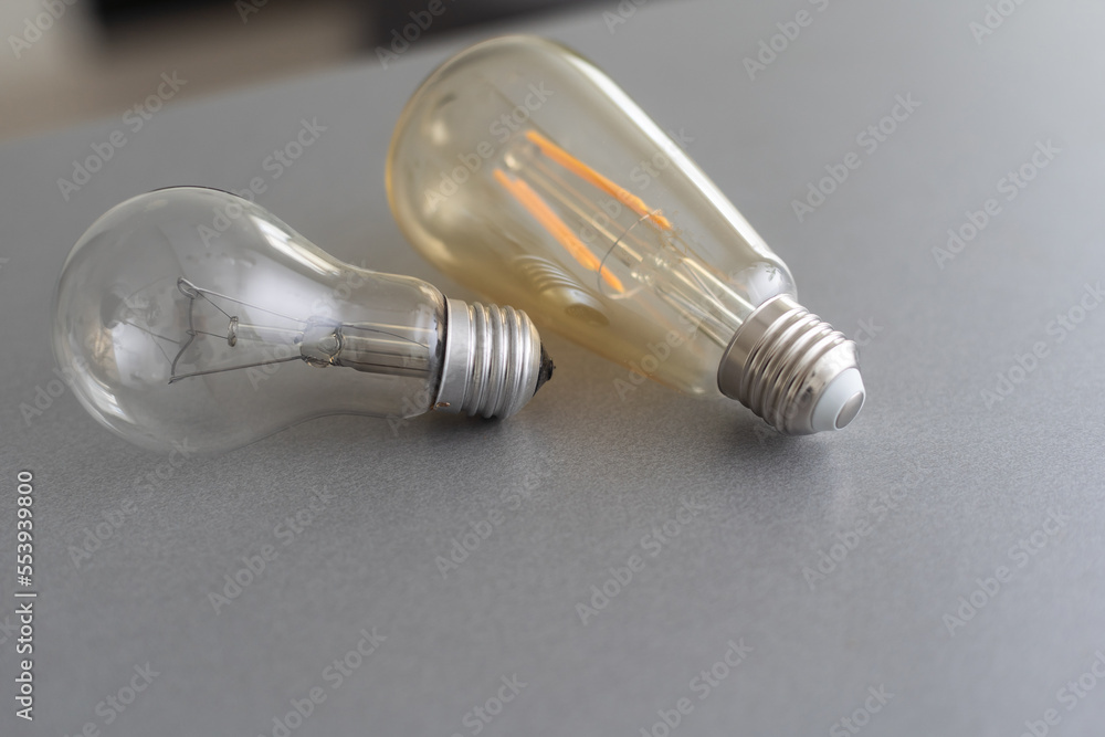 Realistic photo image of light bulbs. isolated bulbs, fluorescent bulbs, orange old generation bulb, Tungsten bulb, and white energy saving bulb Realistic photo image of light bulbs. isolated bulbs, fluorescent bulbs, orange old generation bulb, Tungsten bulb, and white energy saving bulb