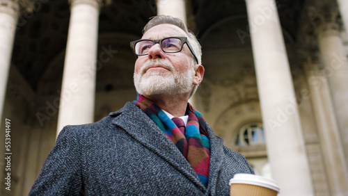 фотографія Portrait of handsome senior business executive looking confidently in the city