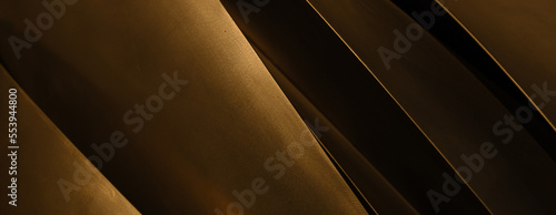 Stainless metal industrial matallic dark abstract background for modern design in warm light