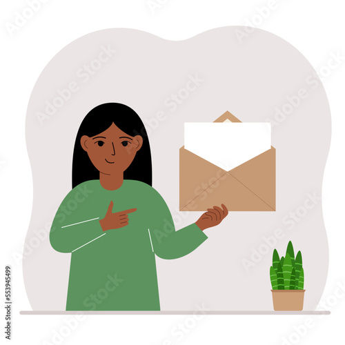 A little girl with an open envelope with a letter. Empty sheet of paper for text template. Mail concept. Sending a message, notification, invitation