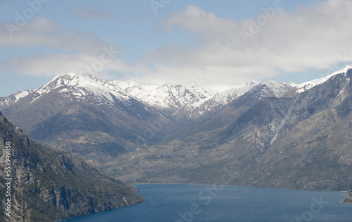 panoramic view of epuyen lake with mountains of the andes of