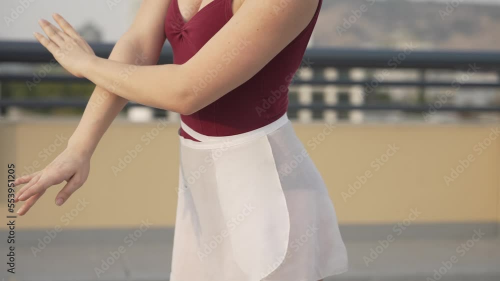 Ballet dancer body in slow motion outside Ballet dancer body in slow motion outside