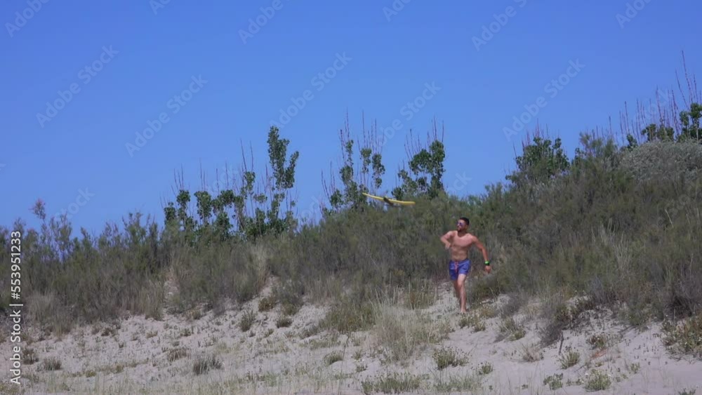A man launches a model glider A man launches a model glider