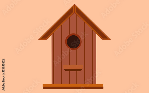 Wooden birdhouse Nesting box on wooden pole.