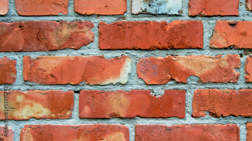 red brick wall. brick texture with concrete. strong union. Banner for insertion into site. Horizontal image.