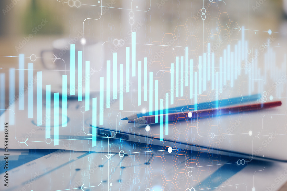Forex graph hologram on table with computer background. Double exposure. Concept of financial markets. Forex graph hologram on table with computer background. Double exposure. Concept of financial markets.