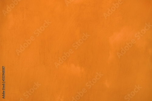 Orange grunge wall background texture