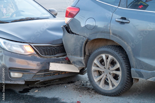 Close-up of two cars involved in a road accident