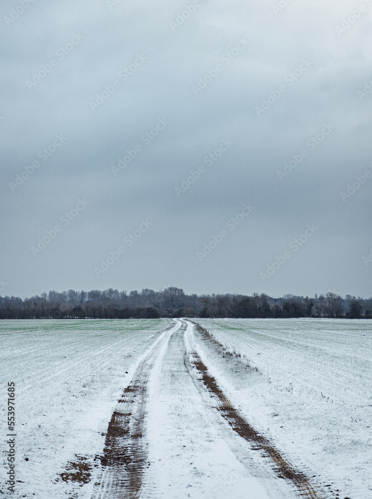 Vehicle Tracks Across A frozen Field In The Rural Oxfordshire Countryside Vehicle Tracks Across A frozen Field In The Rural Oxfordshire Countryside