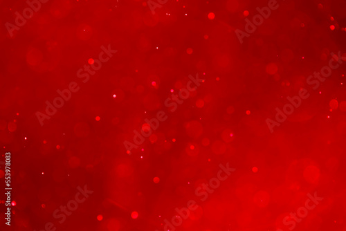 Valentine’s red bokeh glitter  background.