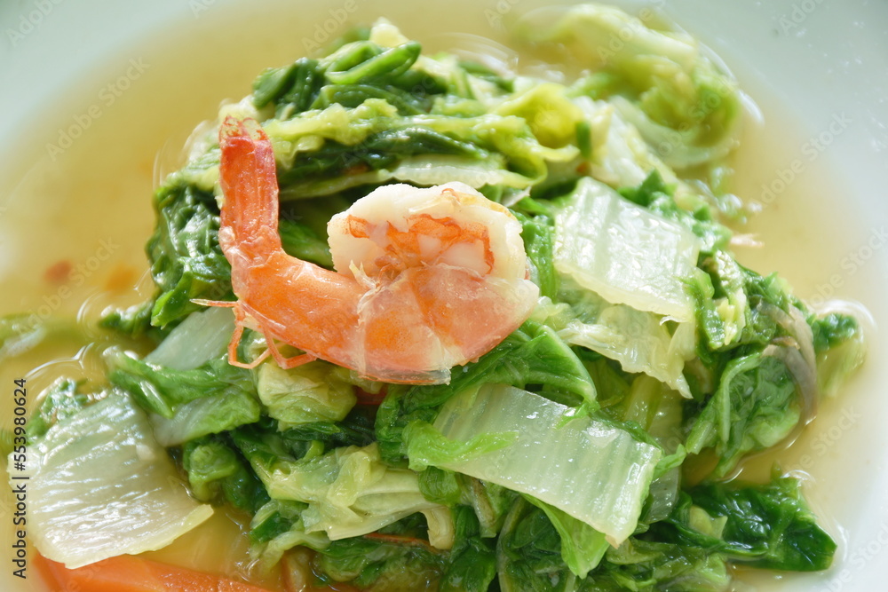 stir fried slice green Chinese cabbage and carrot with shrimp on plate stir fried slice green Chinese cabbage and carrot with shrimp on plate