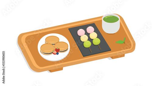 Dorayaki, dango and matcha tea with wooden serving tray