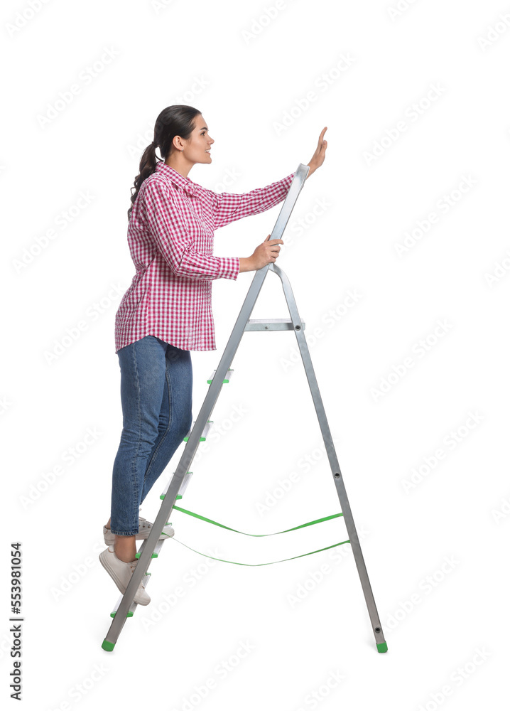 Young woman on metal ladder against white background Young woman on metal ladder against white background