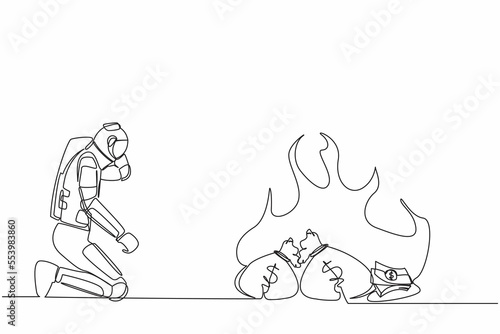 Continuous one line drawing astronaut kneeling and watching money bag burning up. Global financial crisis impacted space industry. Cosmonaut outer space. Single line graphic design vector illustration