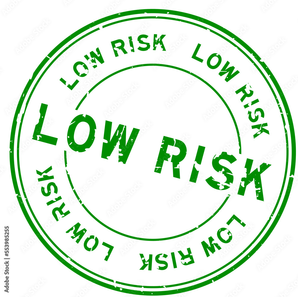 Grunge green low risk word round rubber seal stamp on white background Grunge green low risk word round rubber seal stamp on white background