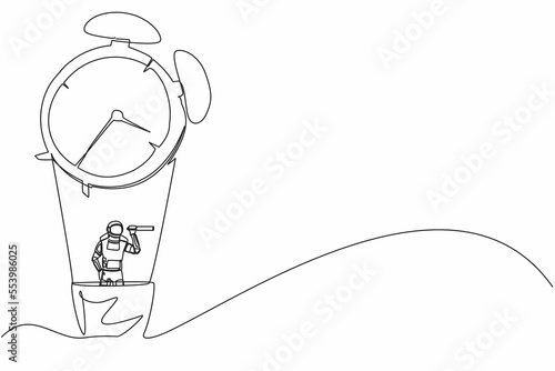 Single one line drawing of young astronaut in hot air balloon with alarm clock looking with telescope or monocular. Cosmic galaxy space concept. Continuous line draw graphic design vector illustration