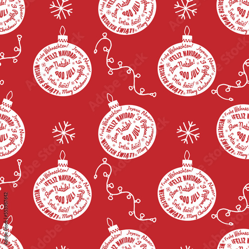 Christmas baubles made from Merry Christmas in different languages on the red background. Vector isolated seamless pattern in white color. Perfect for textile prints, kids design, decor, wrapping.