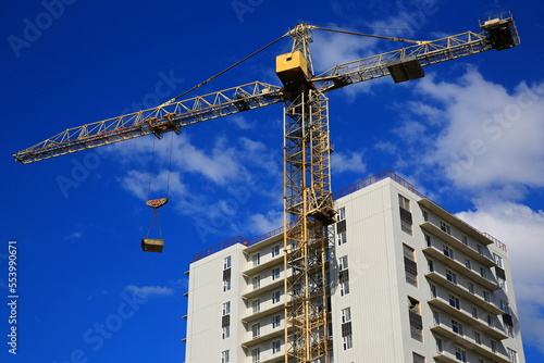 crane building a multi-storey building