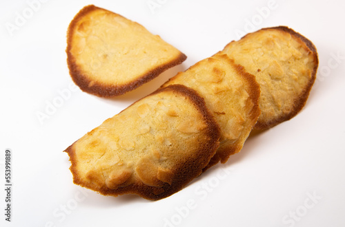 French delicacy pastry tuile with almond on wight background, High quality photo