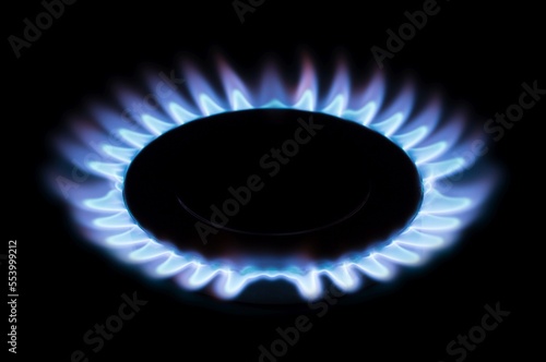 Gas burner, kitchen stove cooking flame close up shot