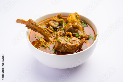 Indian style Mutton OR Gosht Masala OR indian lamb meat rogan josh served with Naan photo