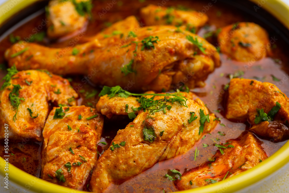 Red Chicken Curry or murgh Masala or korma with prominent Leg Piece Red Chicken Curry or murgh Masala or korma with prominent Leg Piece