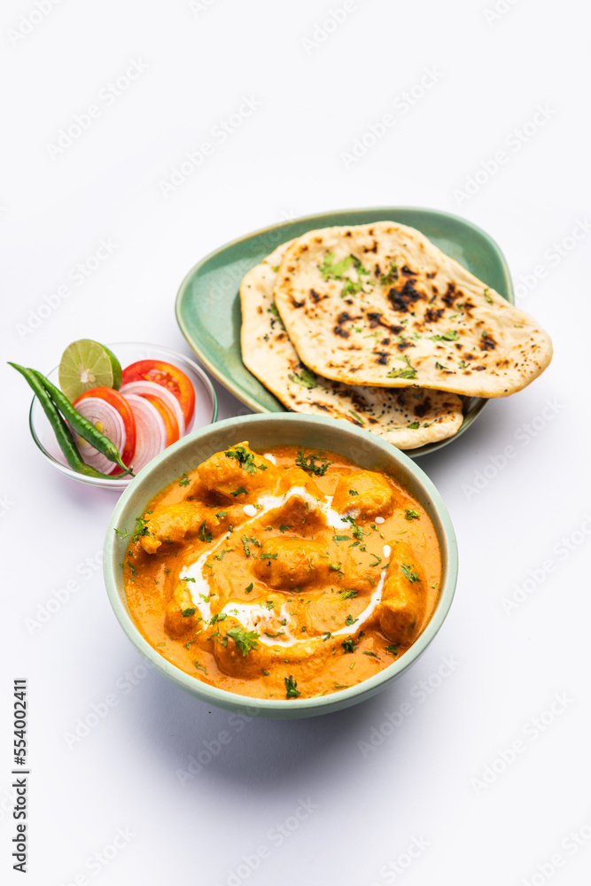 Tasty butter chicken curry or Murg Makhanwala or masala dish from Indian cuisine Tasty butter chicken curry or Murg Makhanwala or masala dish from Indian cuisine
