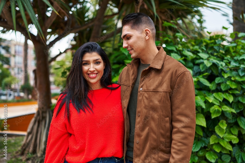 Man and woman couple smiling confident hugging each other at park Man and woman couple smiling confident hugging each other at park