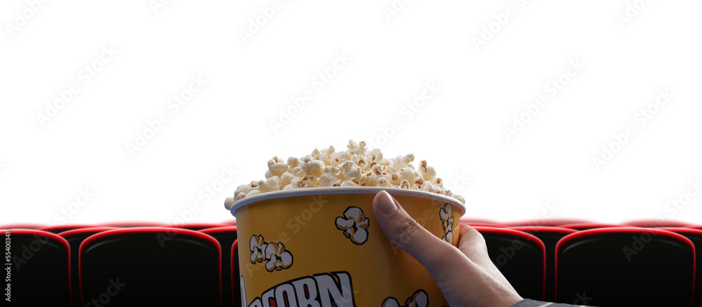 Woman eating popcorn at the cinema - obrazy, fototapety, plakaty 