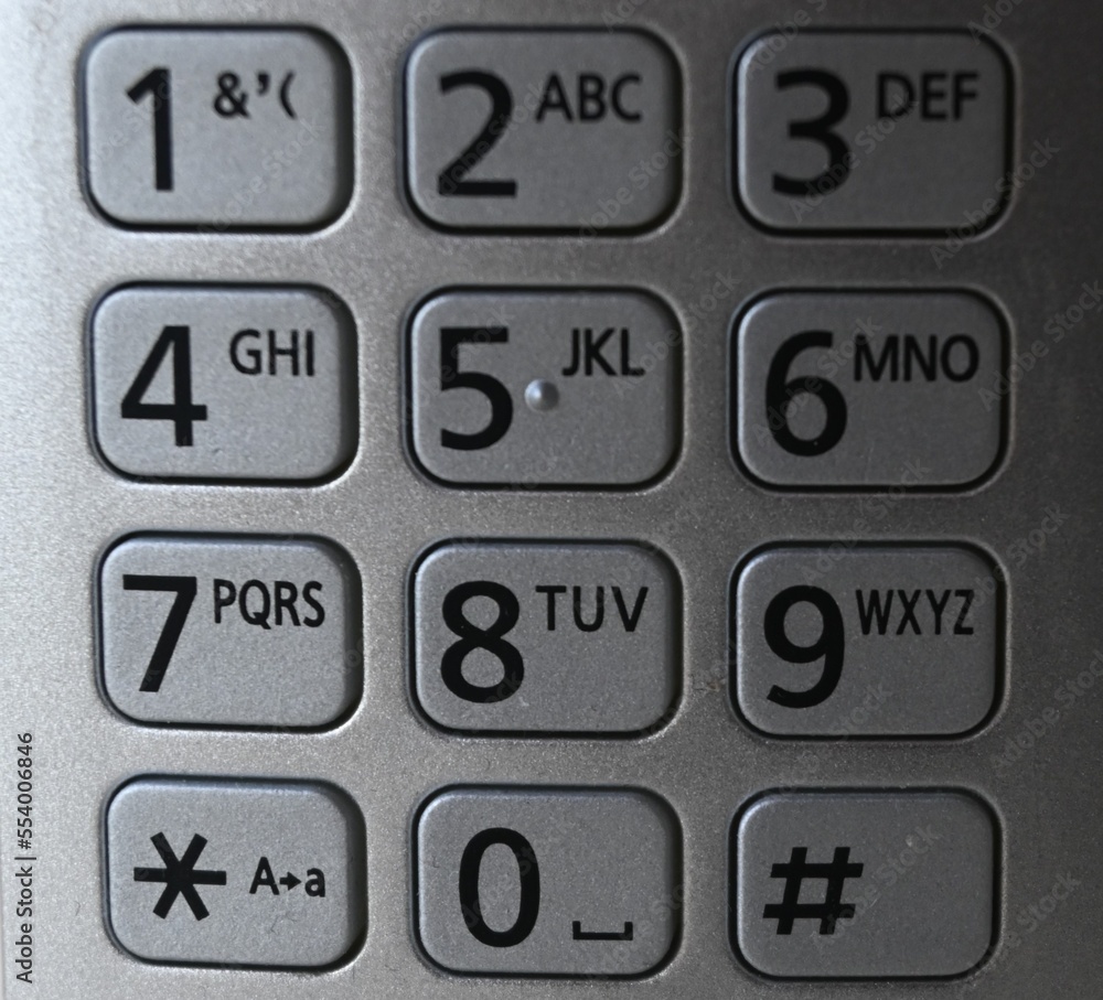 Fondo con detalle y textura de teclado numerico en tonos plata y numeros negros Fondo con detalle y textura de teclado numerico en tonos plata y numeros negros