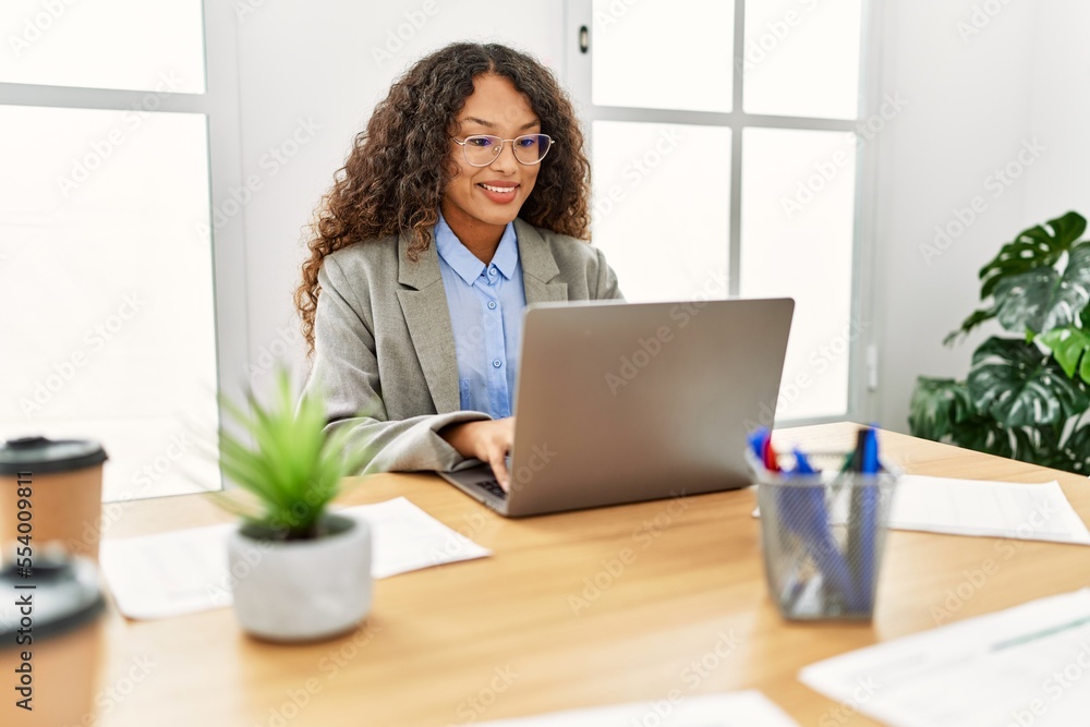 Young latin woman smiling confident working at office Young latin woman smiling confident working at office