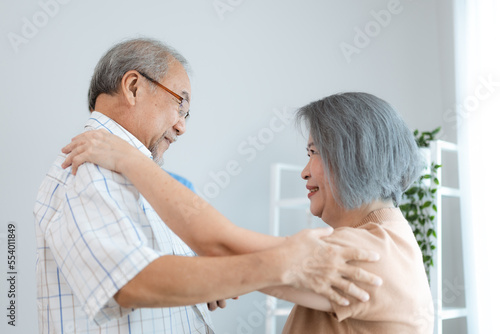 Portrait of happy senior couple with wife embracing husband, nurse doctor senior care caregiver help assistance retirement at home nursing, or hugging after sick in hospital