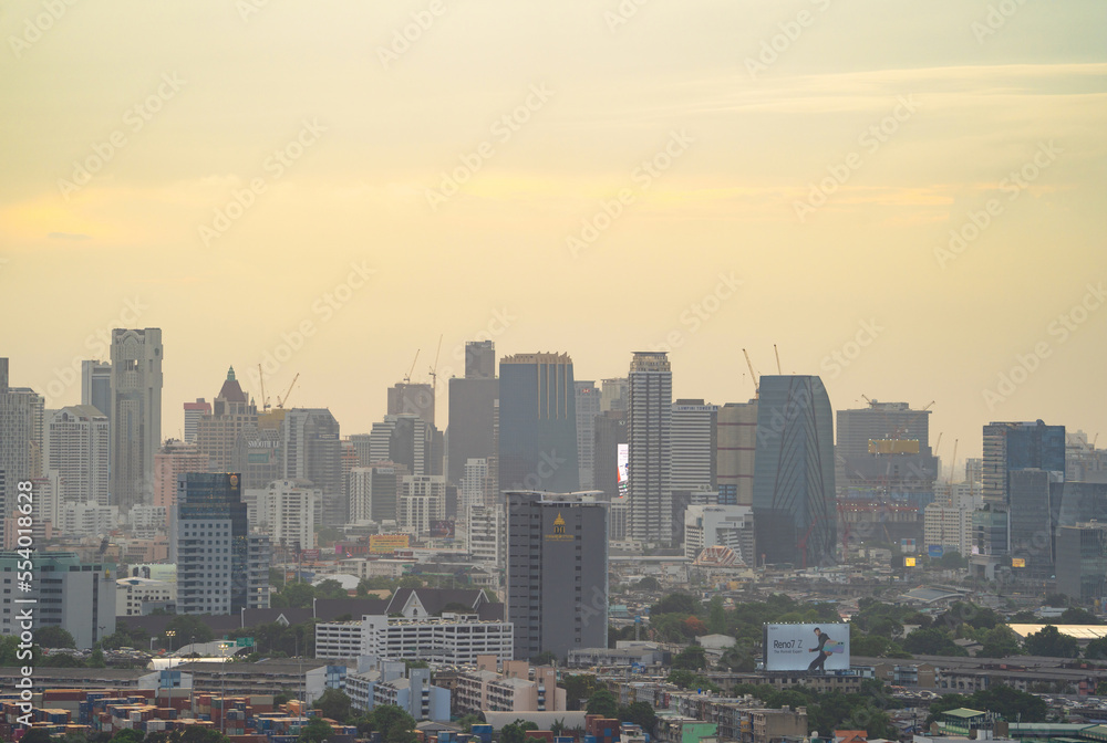 Aerial view of Bangkok Downtown Skyline, Thailand. Financial district and business centers in smart urban city in Asia. Skyscraper and high-rise buildings at sunset.