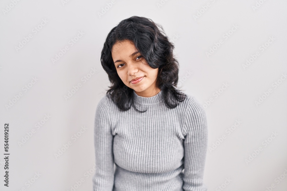 Hispanic woman with dark hair standing over isolated background looking sleepy and tired, exhausted for fatigue and hangover, lazy eyes in the morning. Hispanic woman with dark hair standing over isolated background looking sleepy and tired, exhausted for fatigue and hangover, lazy eyes in the morning.