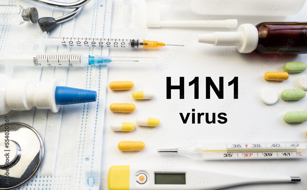 H1N1 swine flu virus. Medicines for treatment on a white background. Virus, epidemic, disease. Medicine concept.