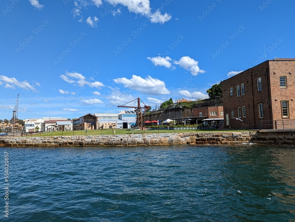A view of the Industrial Precinct from the water as the ferry approaches Cockatoo Island, Sydney, Australia.