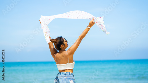 beautiful Happy asian woman traveller enjoy life on tropical beach Vacation trip summer holiday. Freedome life.