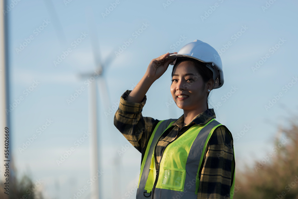 worker in field. silhouette of female with a windmill. silhouette of a person with a windmill worker in field. silhouette of female with a windmill. silhouette of a person with a windmill