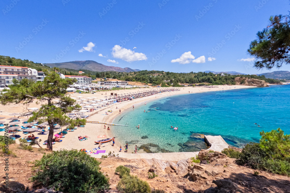 Panoramic viewpoint of summer natural landscape, the seascape turquoise color, and the beautiful and clean Aegean sea. Pine trees surround coast. Holiday travel concept. 