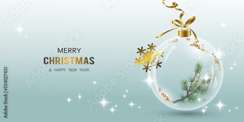A transparent glass ball with a pine branch inside, a golden snowflake,  a congratulatory inscription. Realistic Christmas tree decoration toy. Festive Christmas background for greeting card, banner.