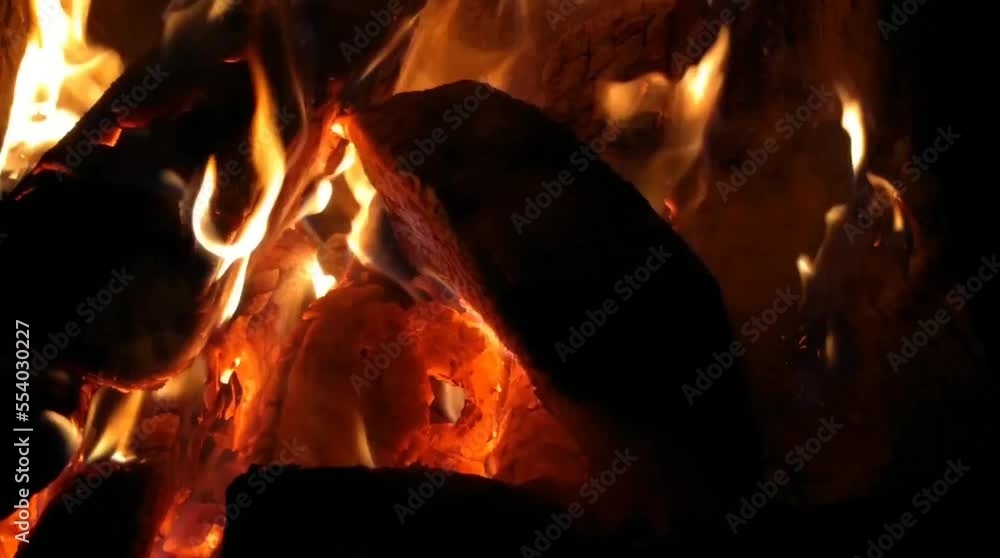 Fire with firewood in the evening before the new year Fire with firewood in the evening before the new year