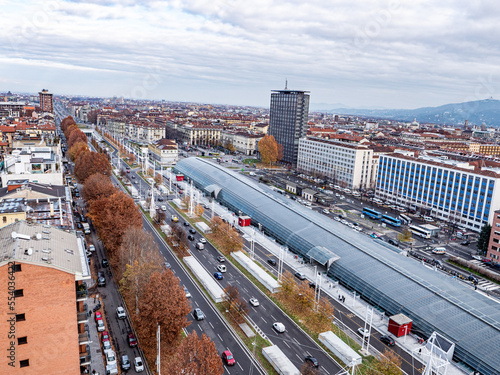 Skyline of Turin, Italy, in winter. The mountain in back and the Mole Antonelliana, Piazza Castello, Porta Susa Station, Turin court and the city centre. The city in winter with a blue sky