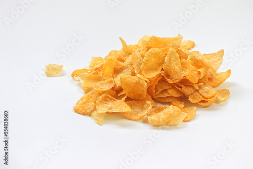 Tasty cornflakes on white background.