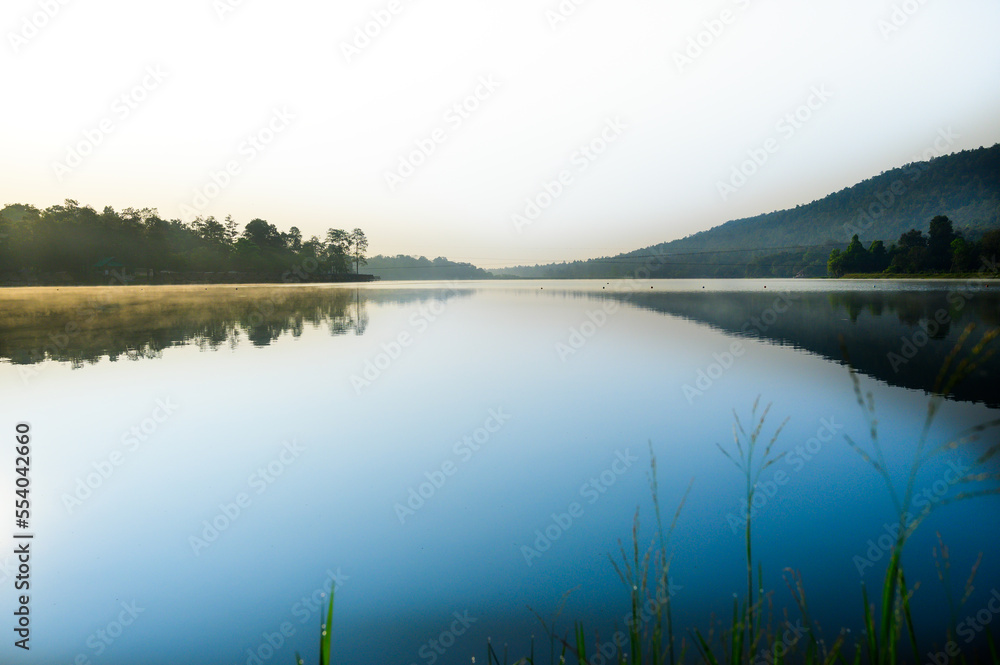 Huay Tueng Thao Lake in the early morning, the lake offers beautiful scenery, fresh air and steam rising from the surface