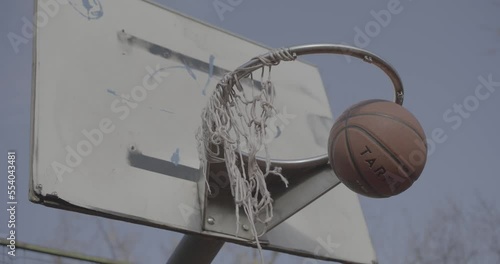 Scoring at basketball on an old vintage hoop in slow motion 4K F-LOG2 video format