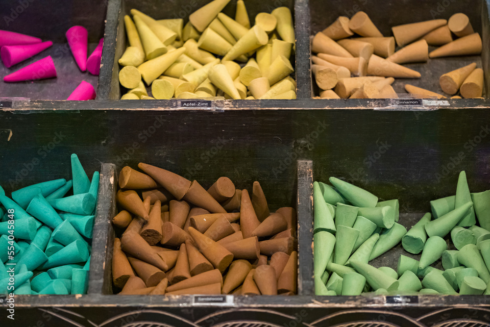 A selection of colored cone shaped incense cones on the market A selection of colored cone shaped incense cones on the market